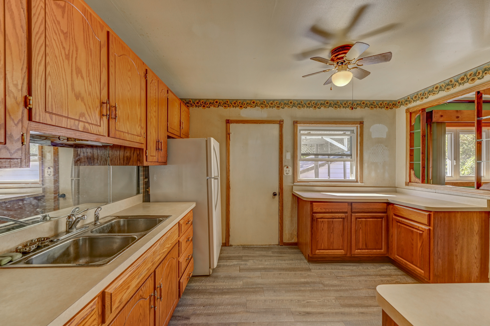 2602 Fairway Drive Joliet, IL 60435 - Photo 2 of 20 a kitchen with stainless steel appliances granite countertop a sink stove and cabinets