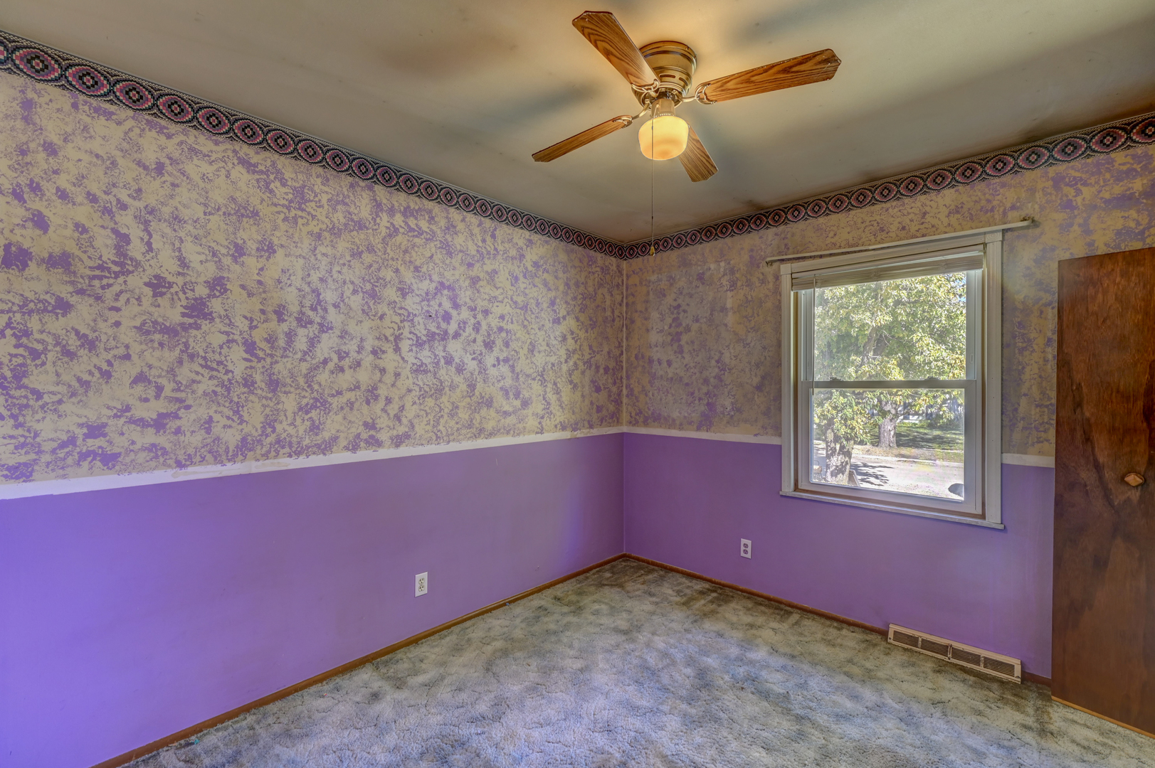 2602 Fairway Drive Joliet, IL 60435 - Photo 9 of 20 a view of a livingroom with a window and a ceiling fan