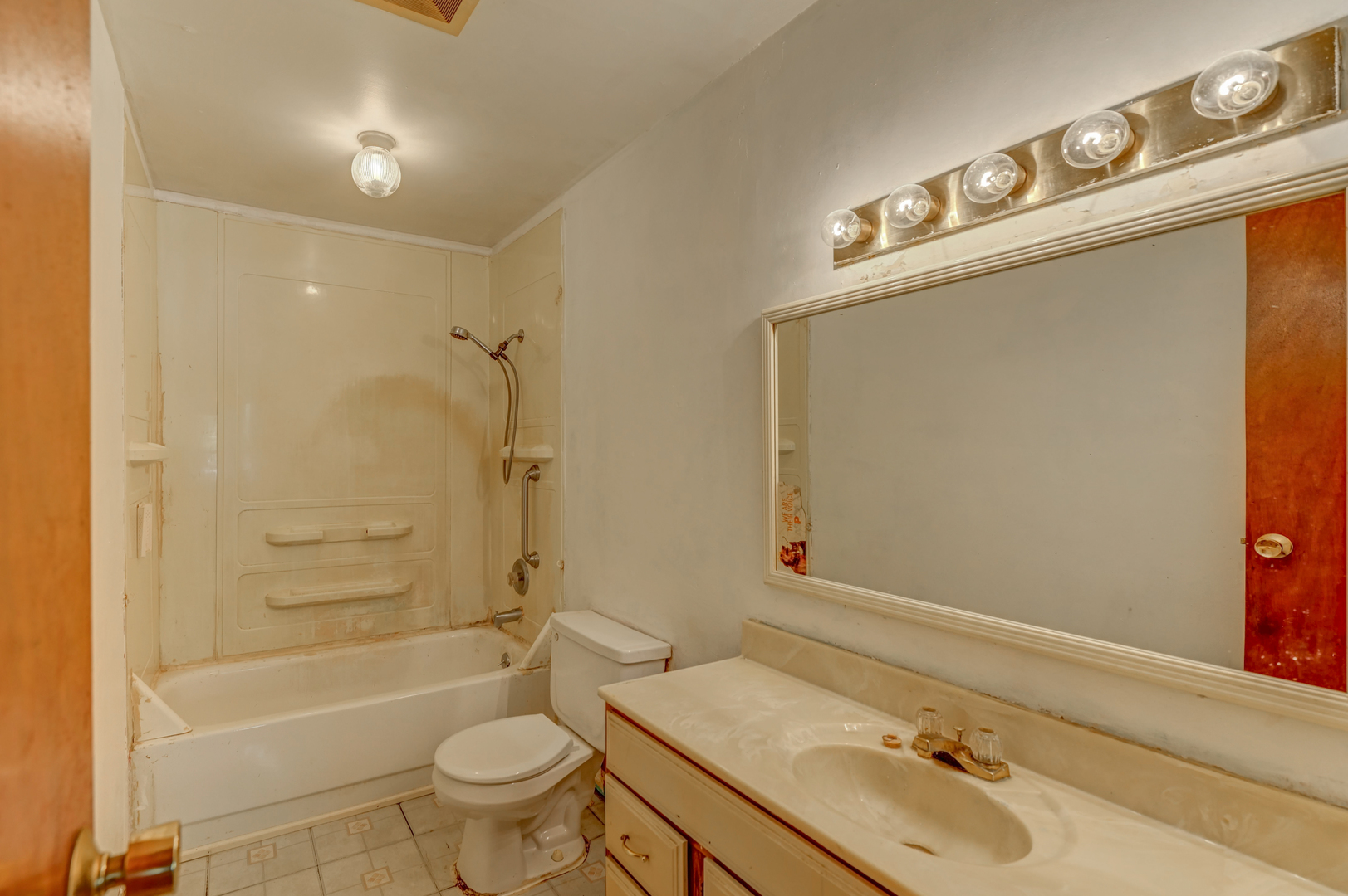2602 Fairway Drive Joliet, IL 60435 - Photo 10 of 20 a bathroom with a sink a toilet and shower