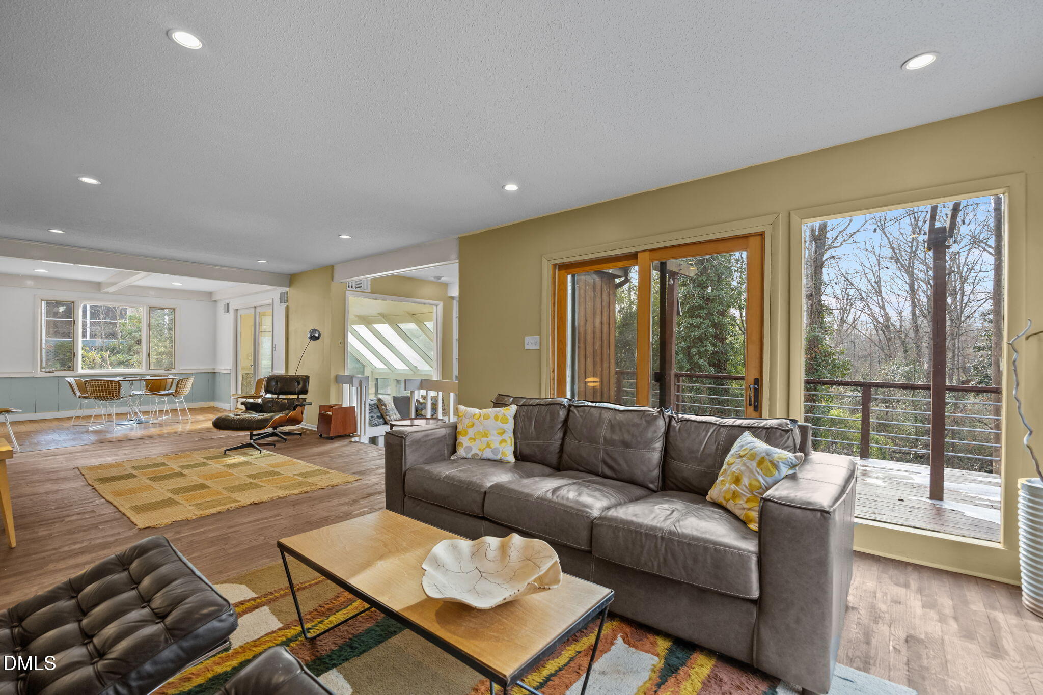 1108 Hemingway Drive Raleigh, NC 27609 - Photo 11 of 68 a living room with furniture and a large window
