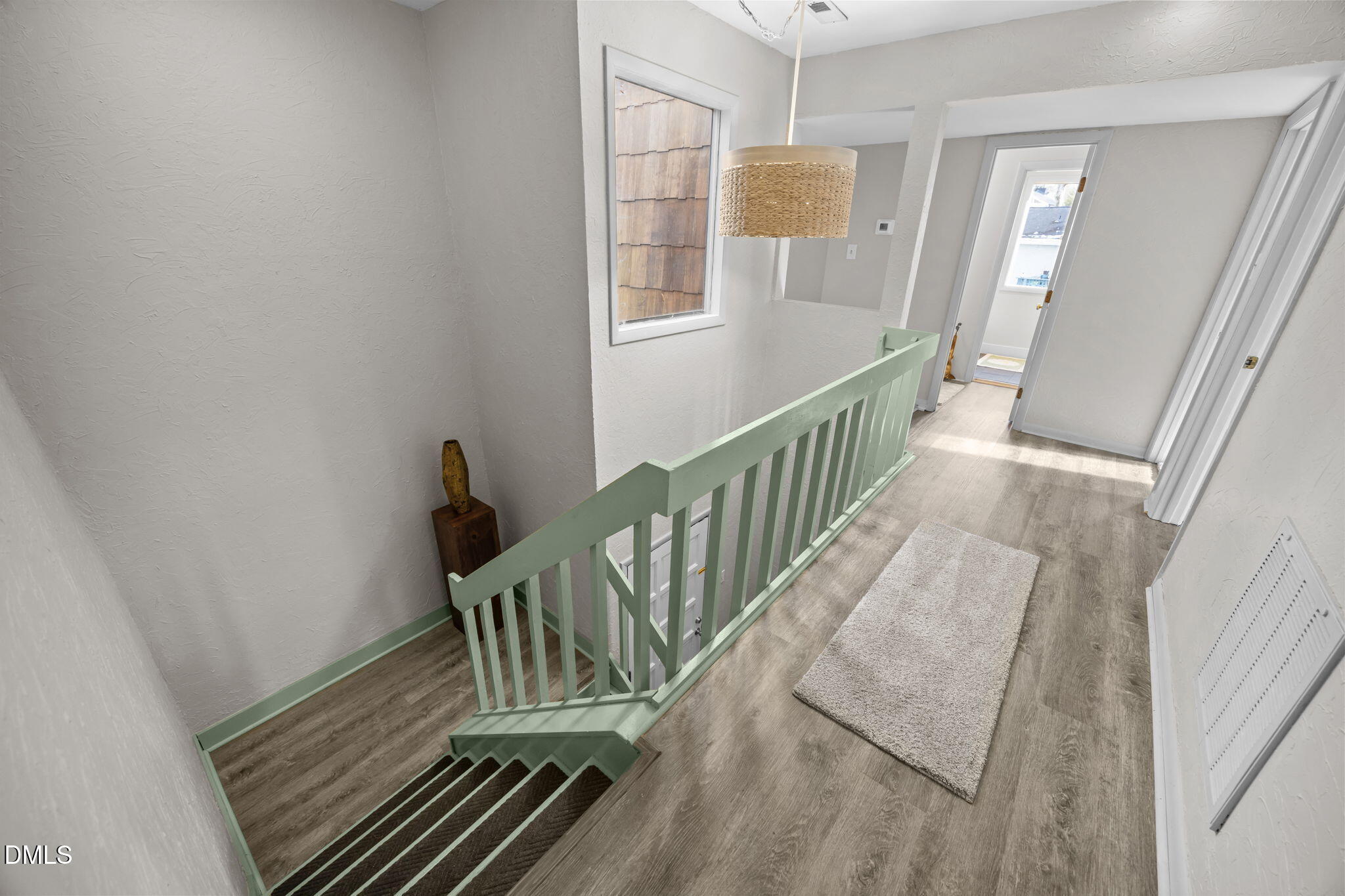 1108 Hemingway Drive Raleigh, NC 27609 - Photo 31 of 68 a view of balcony and wooden floor