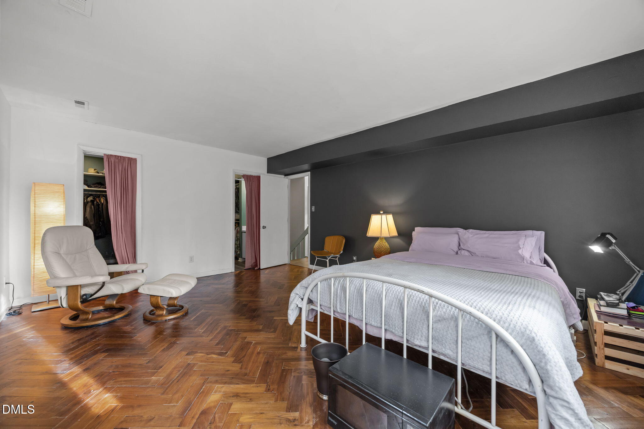 1108 Hemingway Drive Raleigh, NC 27609 - Photo 35 of 68 a bedroom with a bed a desk and chair