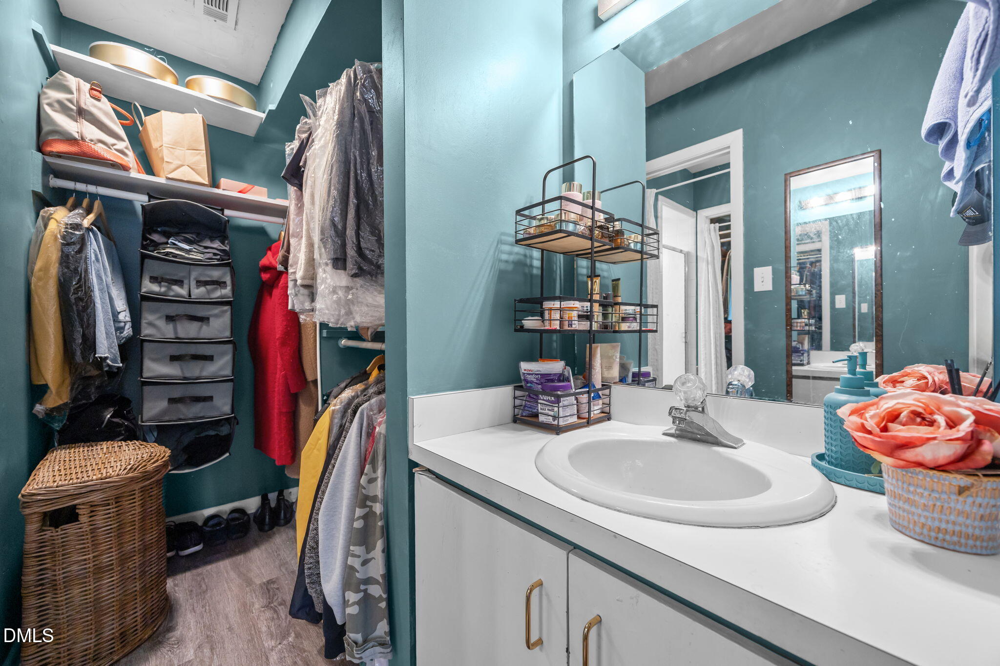 1108 Hemingway Drive Raleigh, NC 27609 - Photo 36 of 68 a bathroom with a sink a mirror and shower