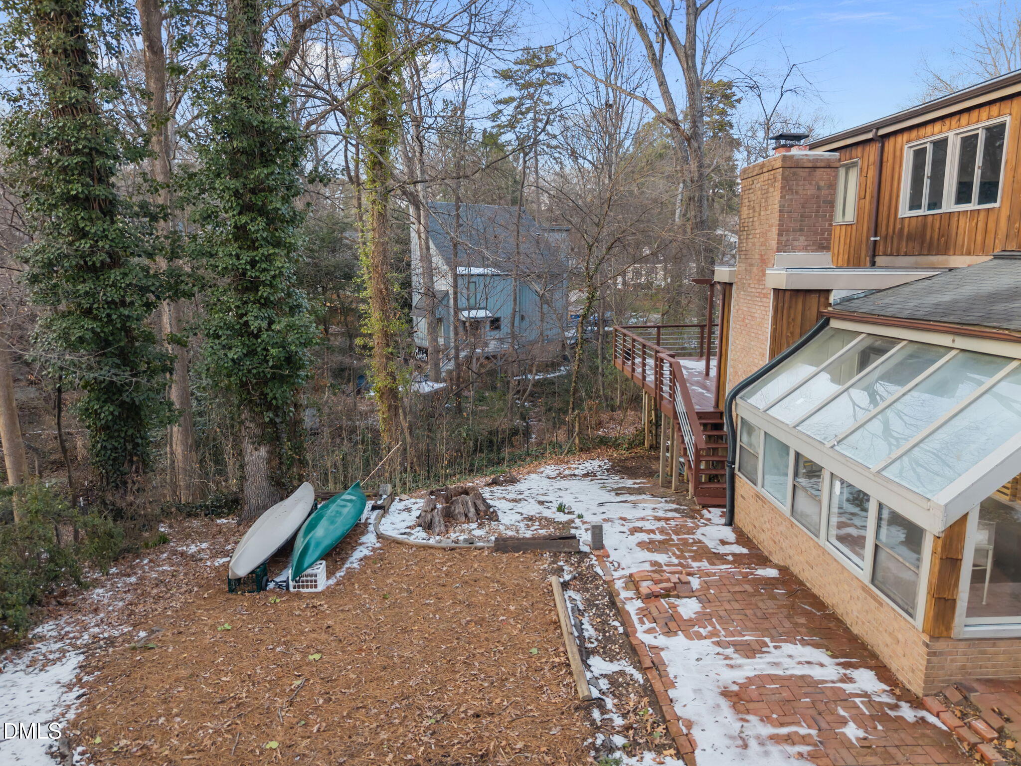 1108 Hemingway Drive Raleigh, NC 27609 - Photo 58 of 68 a view of a brick house with a yard and large trees