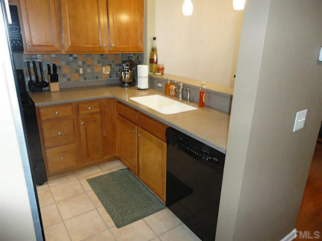 2530 Asher View Court Raleigh, NC 27606 - Photo 4 of 25 Lots of counters and great cabinets for you