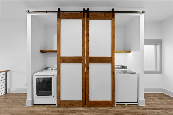a bathroom with a shower and a mirror
