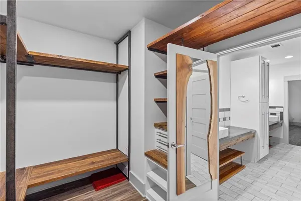 a view of bathroom with dual sinks