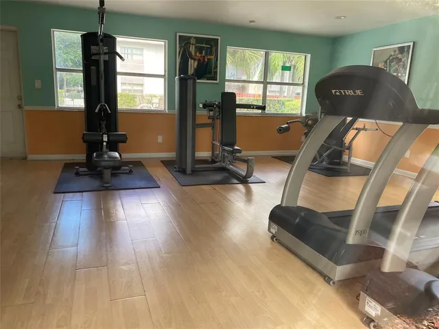 a view of a room with gym equipment