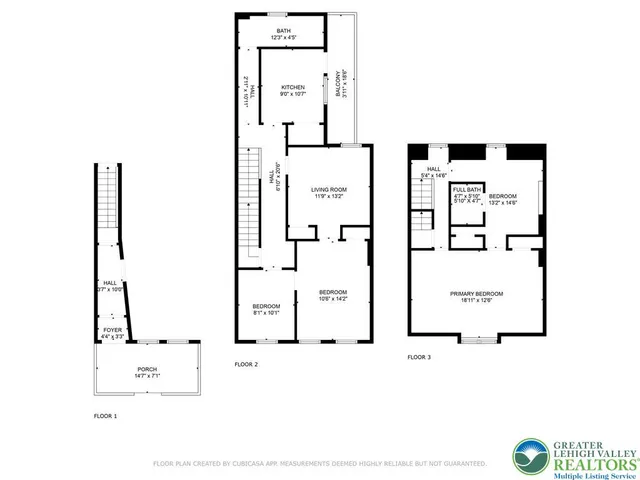 a black and white photo of a living room