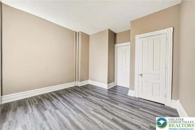 a kitchen with stainless steel appliances granite countertop a stove a sink dishwasher and a refrigerator