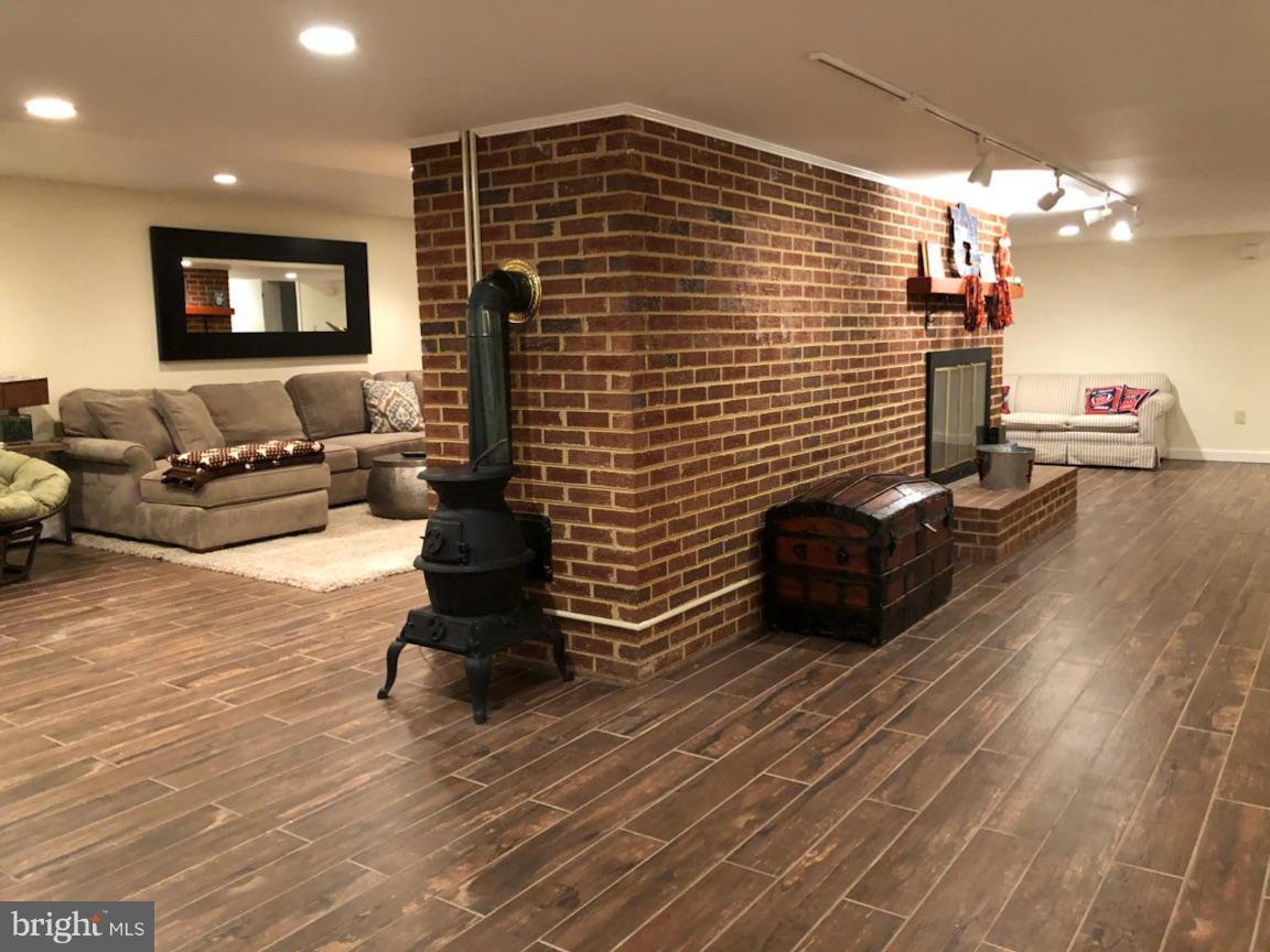 13101 Springdale Estates Road Clifton, VA 20124 - Photo 22 of 30 Tile floor and All Brick Double Sided Fireplace