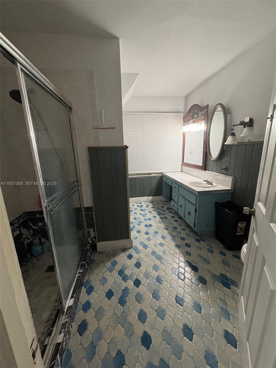 2619 Southwest 5th Street Miami, FL 33135 - Photo 11 of 17 a bathroom with sink toilet and shower