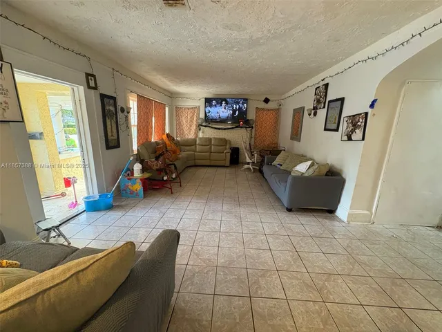 a living room with furniture and a couch