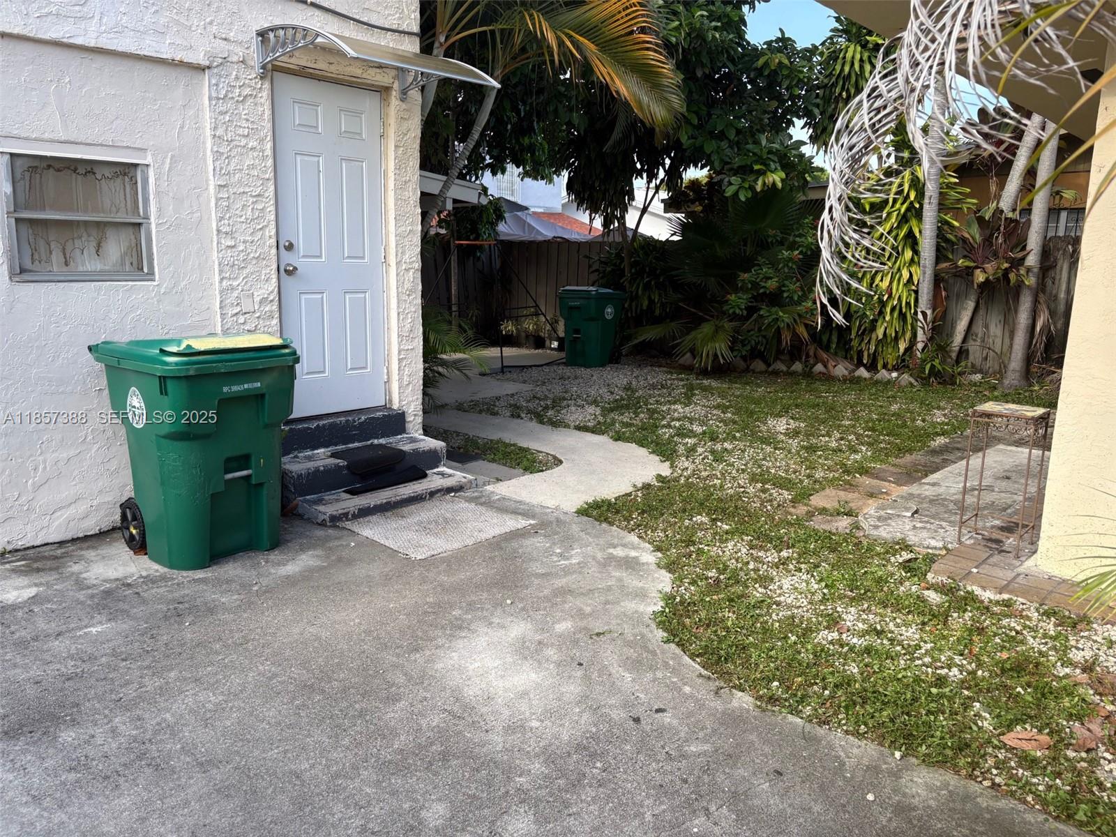 2619 Southwest 5th Street Miami, FL 33135 - Photo 17 of 17 a view of a chair and table in the yard