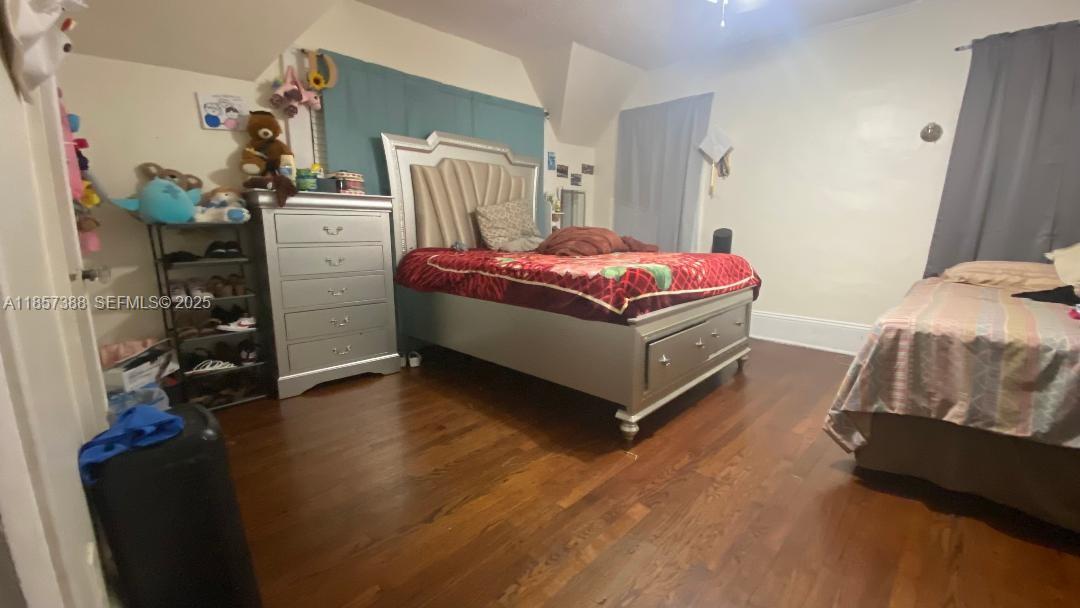 2619 Southwest 5th Street Miami, FL 33135 - Photo 4 of 17 a bedroom with a bed and a closet