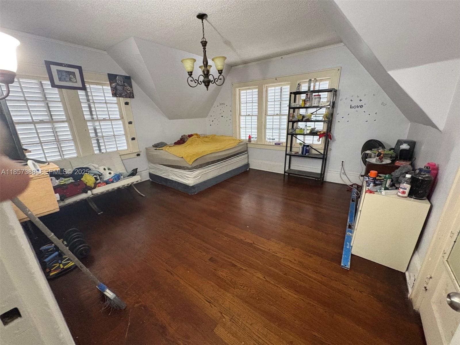 2619 Southwest 5th Street Miami, FL 33135 - Photo 5 of 17 a living room with furniture and a window