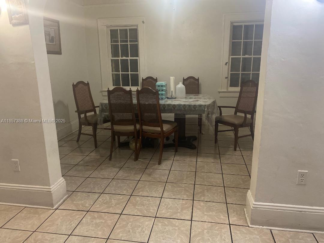 2619 Southwest 5th Street Miami, FL 33135 - Photo 7 of 17 a view of a dining room with furniture