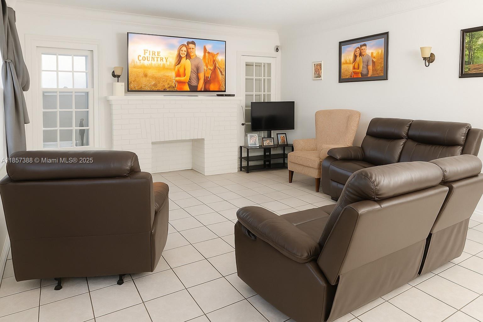 2619 Southwest 5th Street Miami, FL 33135 - Photo 8 of 17 a living room with furniture and a flat screen tv