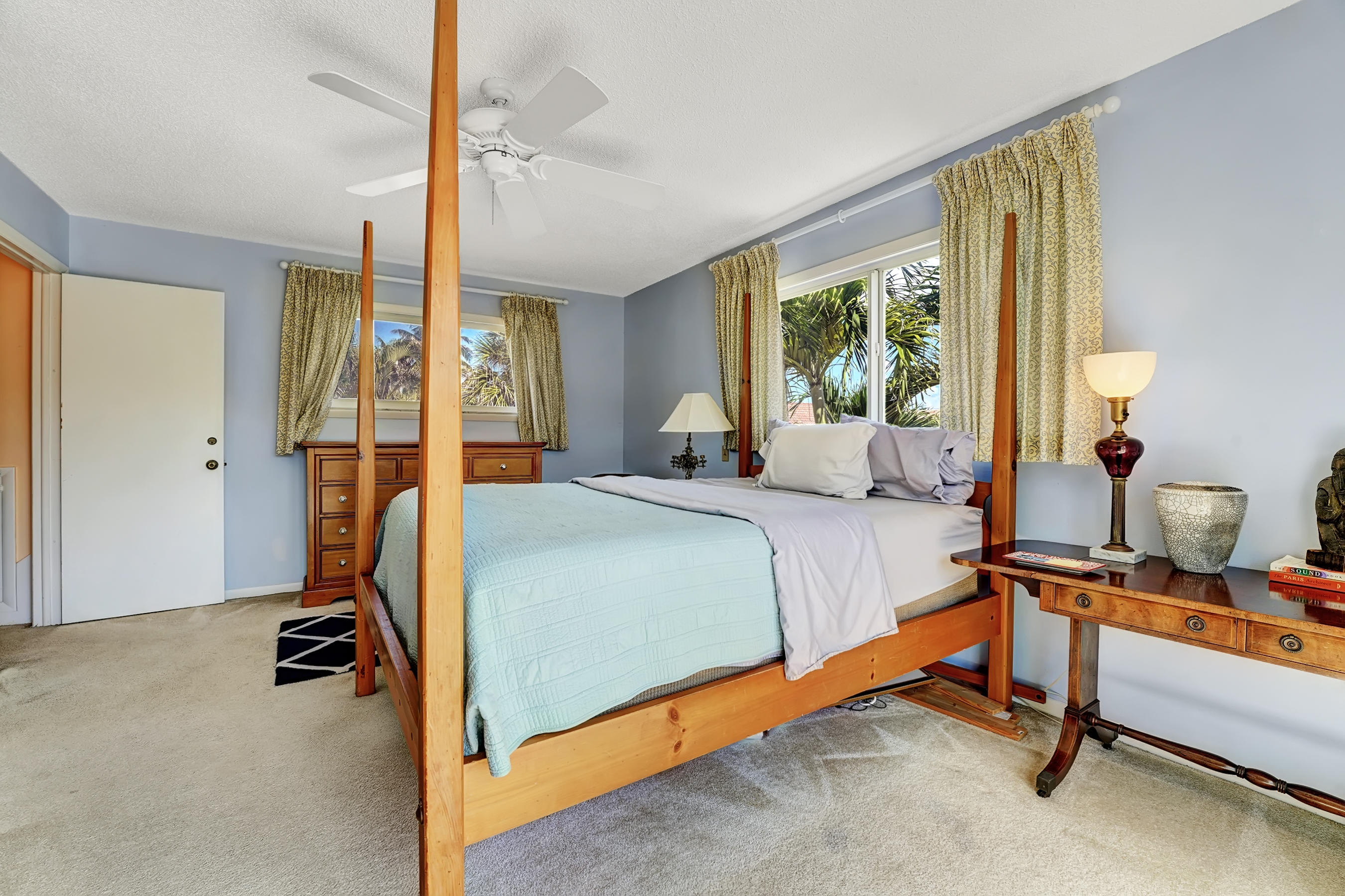 16 Sailfish Lane Ocean Ridge, FL 33435 - Photo 18 of 37 a bedroom with a bed and a window