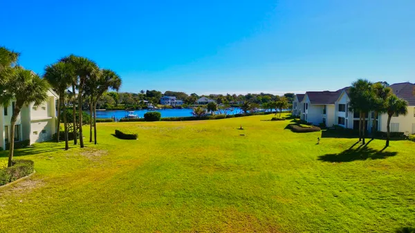 a view of a room with shelf with racks on the wall