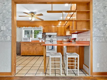 a room with a table and chairs