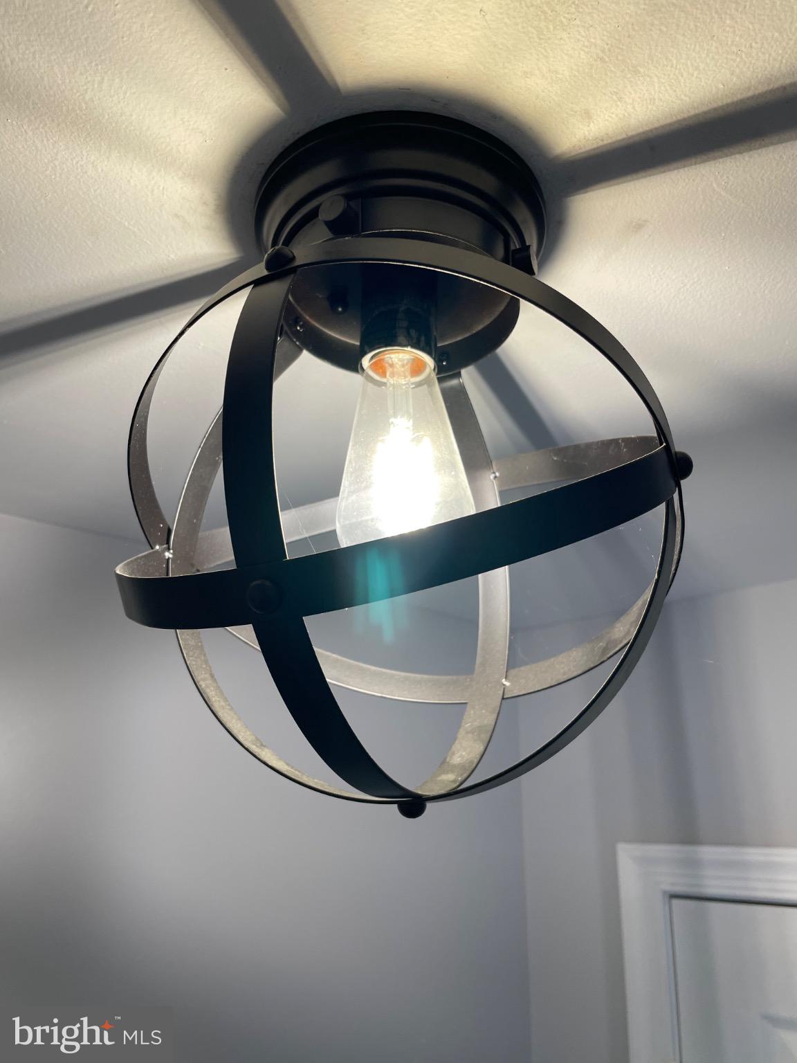 1401 Key Parkway, Unit 204 Frederick, MD 21702 - Photo 20 of 27 Modern orb entry light fixture.