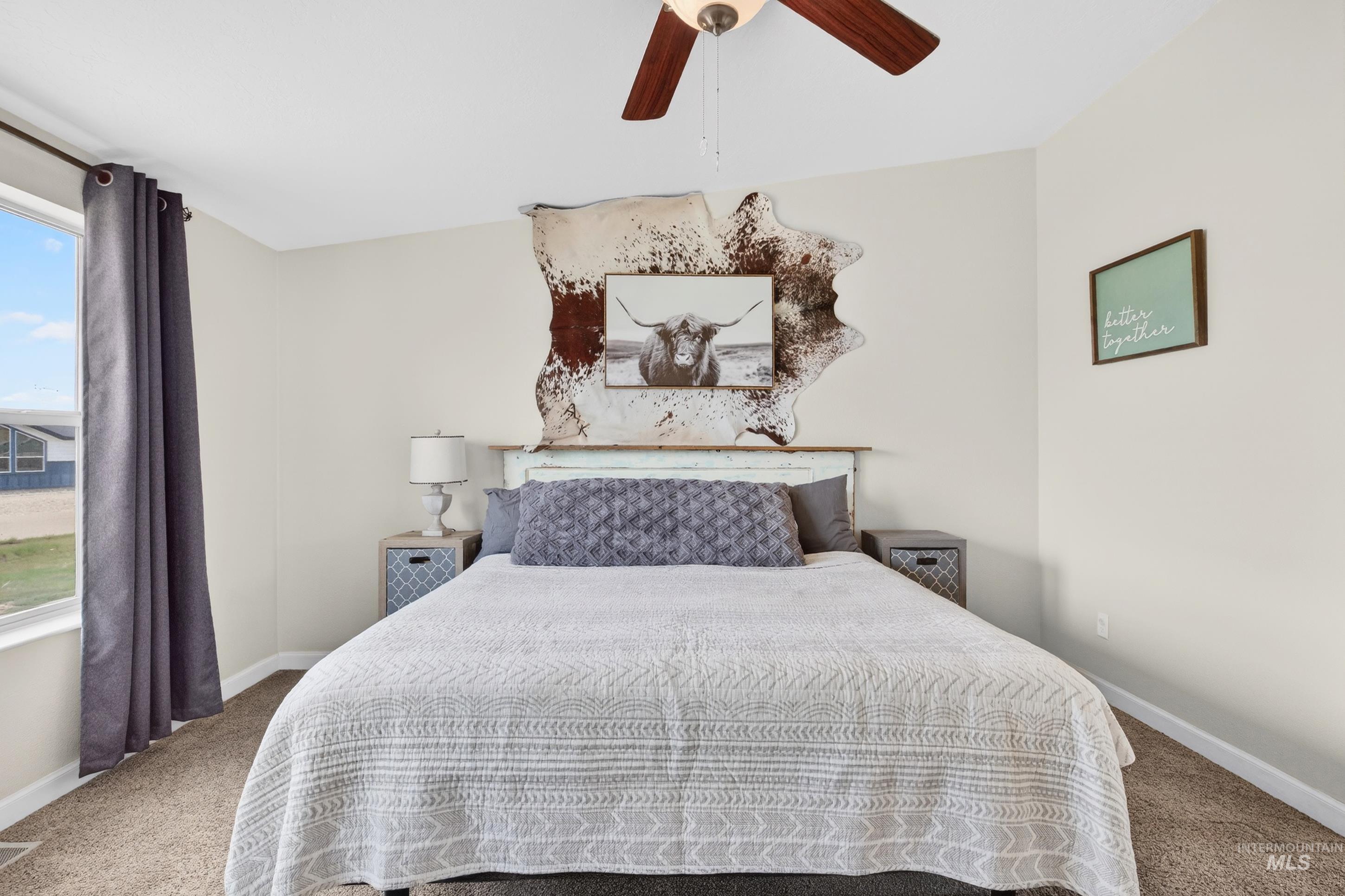 728 Chase Lane Melba, ID 83641 - Photo 22 of 48 Carpeted bedroom featuring baseboards and a ceiling fan