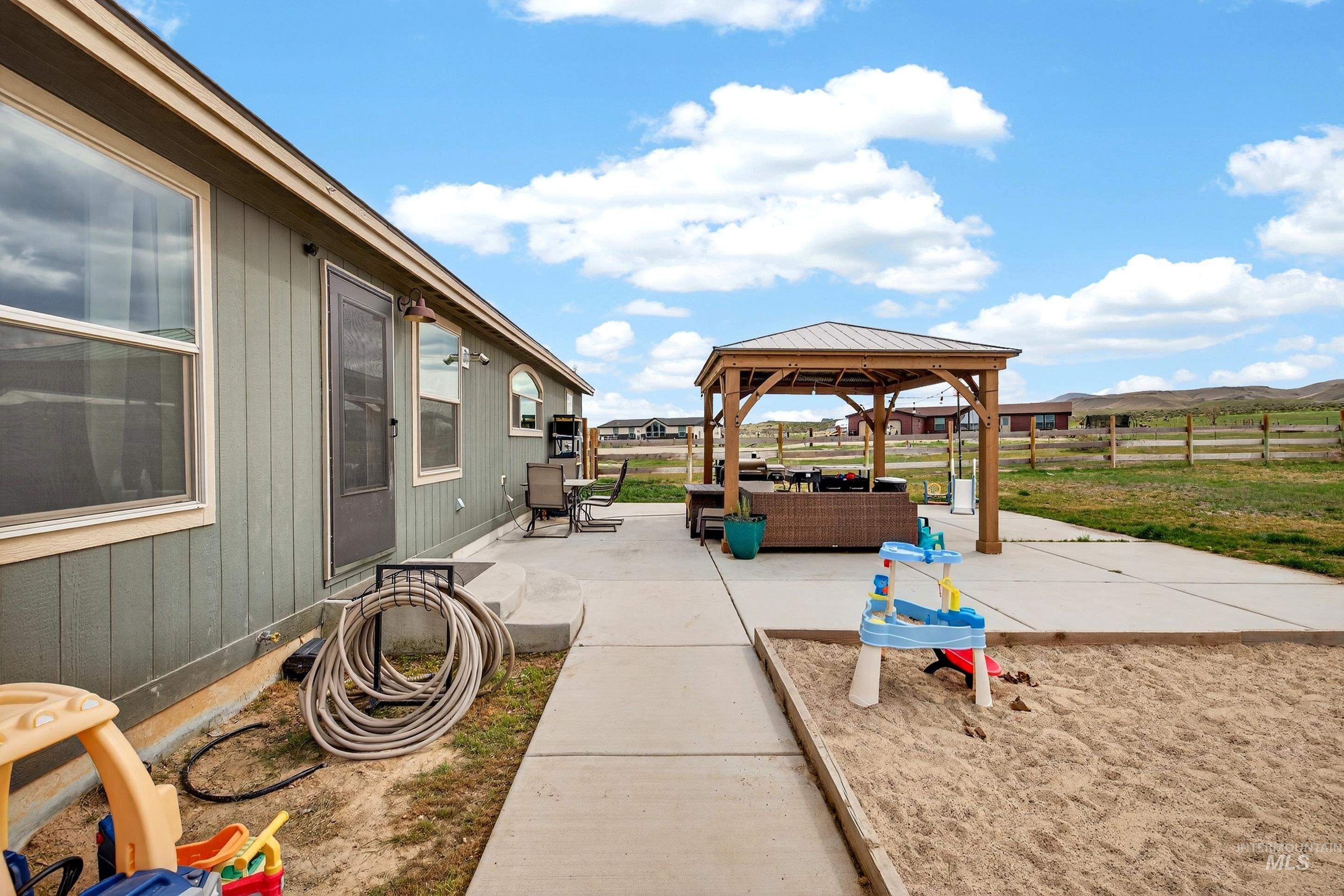 728 Chase Lane Melba, ID 83641 - Photo 42 of 48 View of patio with a gazebo and an outdoor living space
