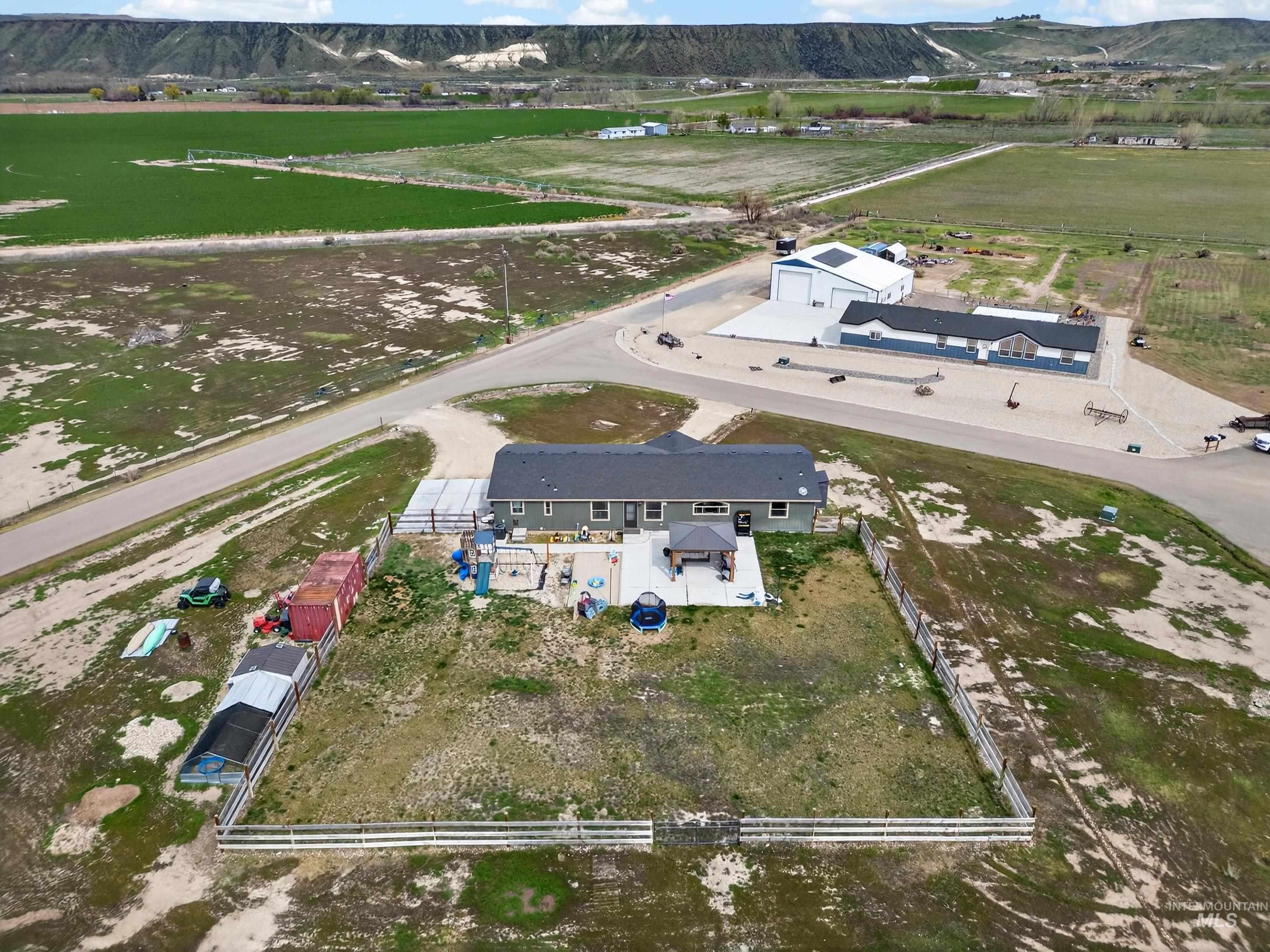 728 Chase Lane Melba, ID 83641 - Photo 46 of 48 Aerial view of property and surrounding area with rural landscape