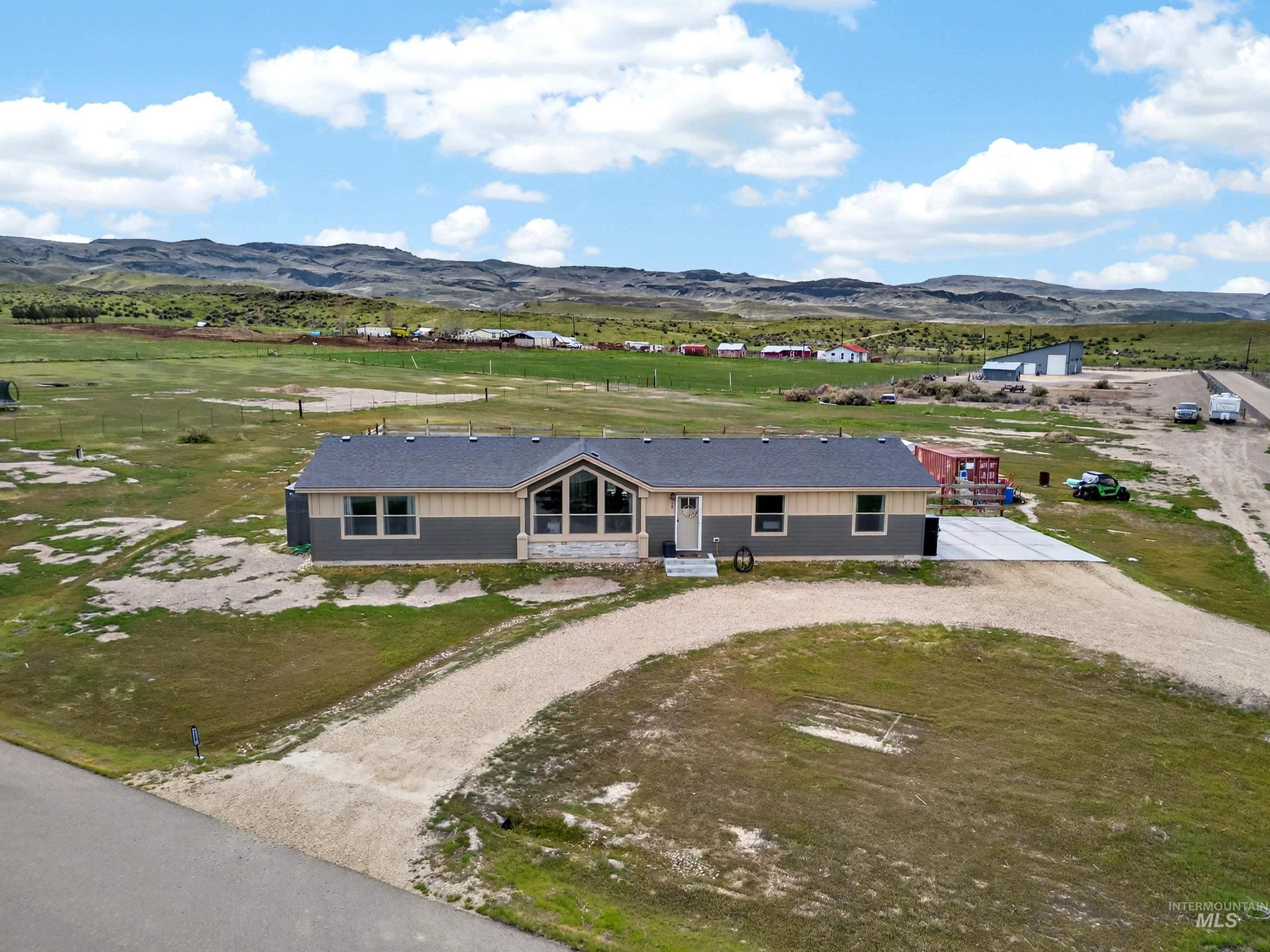 728 Chase Lane Melba, ID 83641 - Photo 47 of 48 View from above of property featuring a mountain backdrop