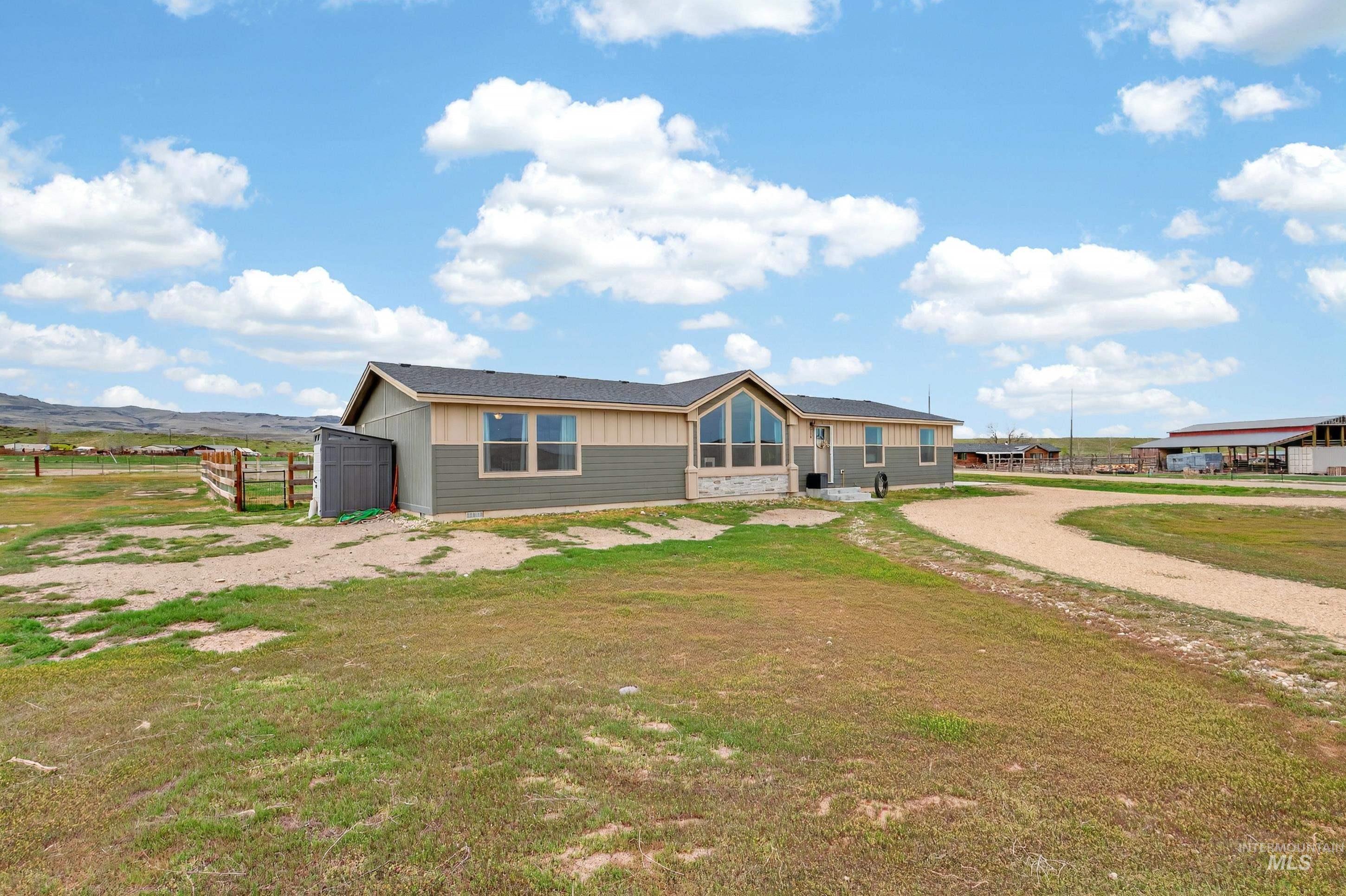 728 Chase Lane Melba, ID 83641 - Photo 5 of 48 View of front of property featuring an outbuilding