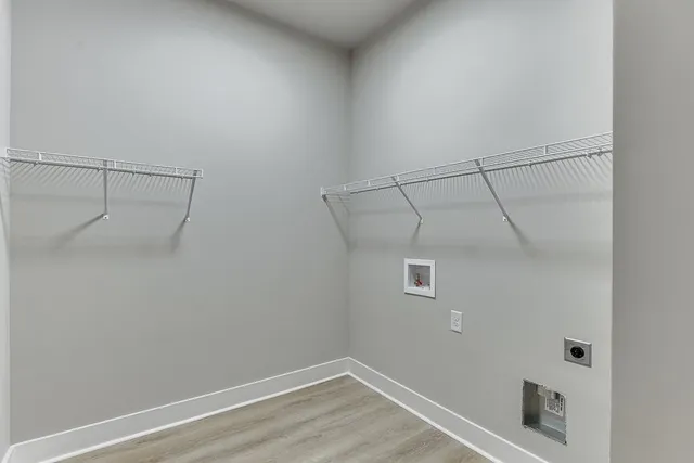 a view of a room with racks on the wall