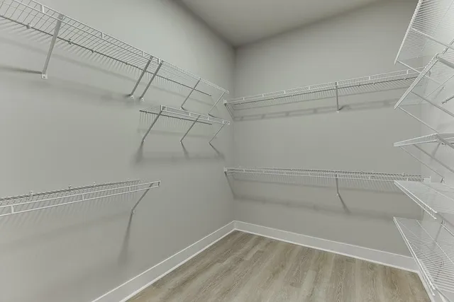 a view of a room with racks on the wall