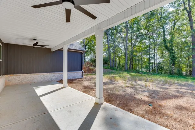 a backyard of a house with lots of green space