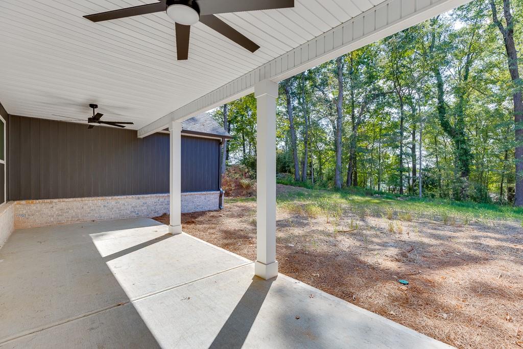 115 Rains Road Jefferson, GA 30549 - Photo 38 of 41 a backyard of a house with lots of green space