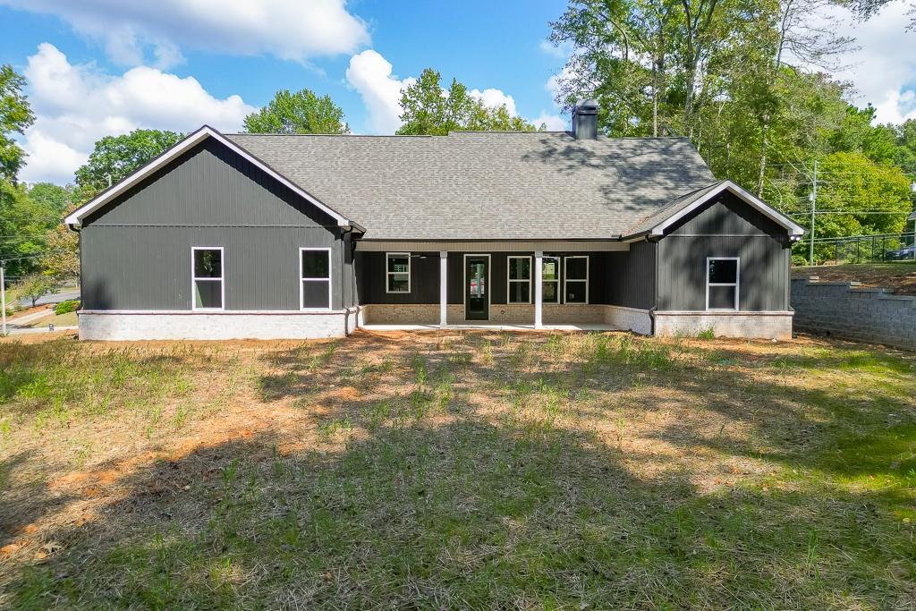 115 Rains Road Jefferson, GA 30549 - Photo 40 of 41 a house with trees in the background