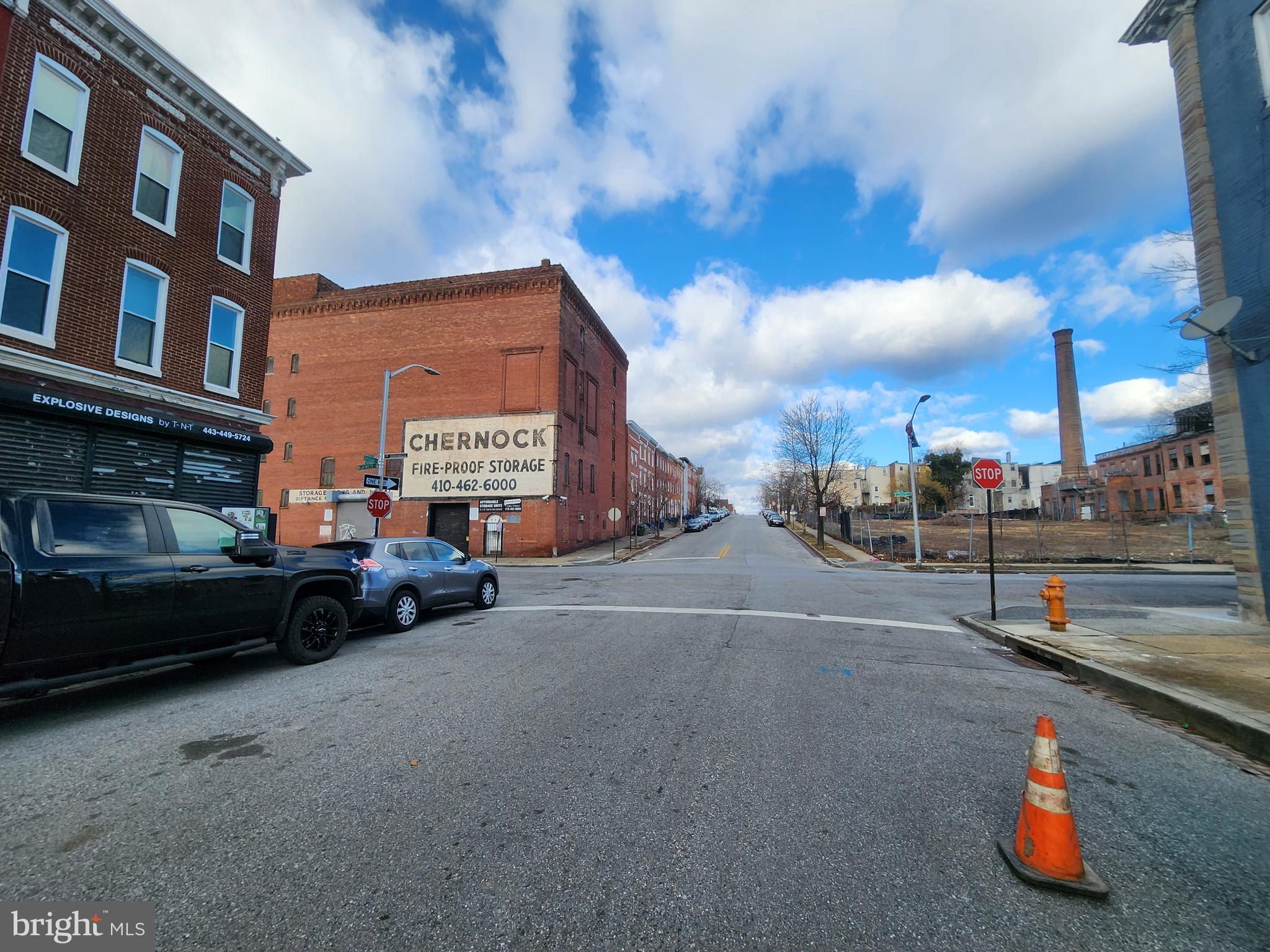 1344 Division Street Baltimore, MD 21217 - Photo 3 of 8 a view of a street with cars