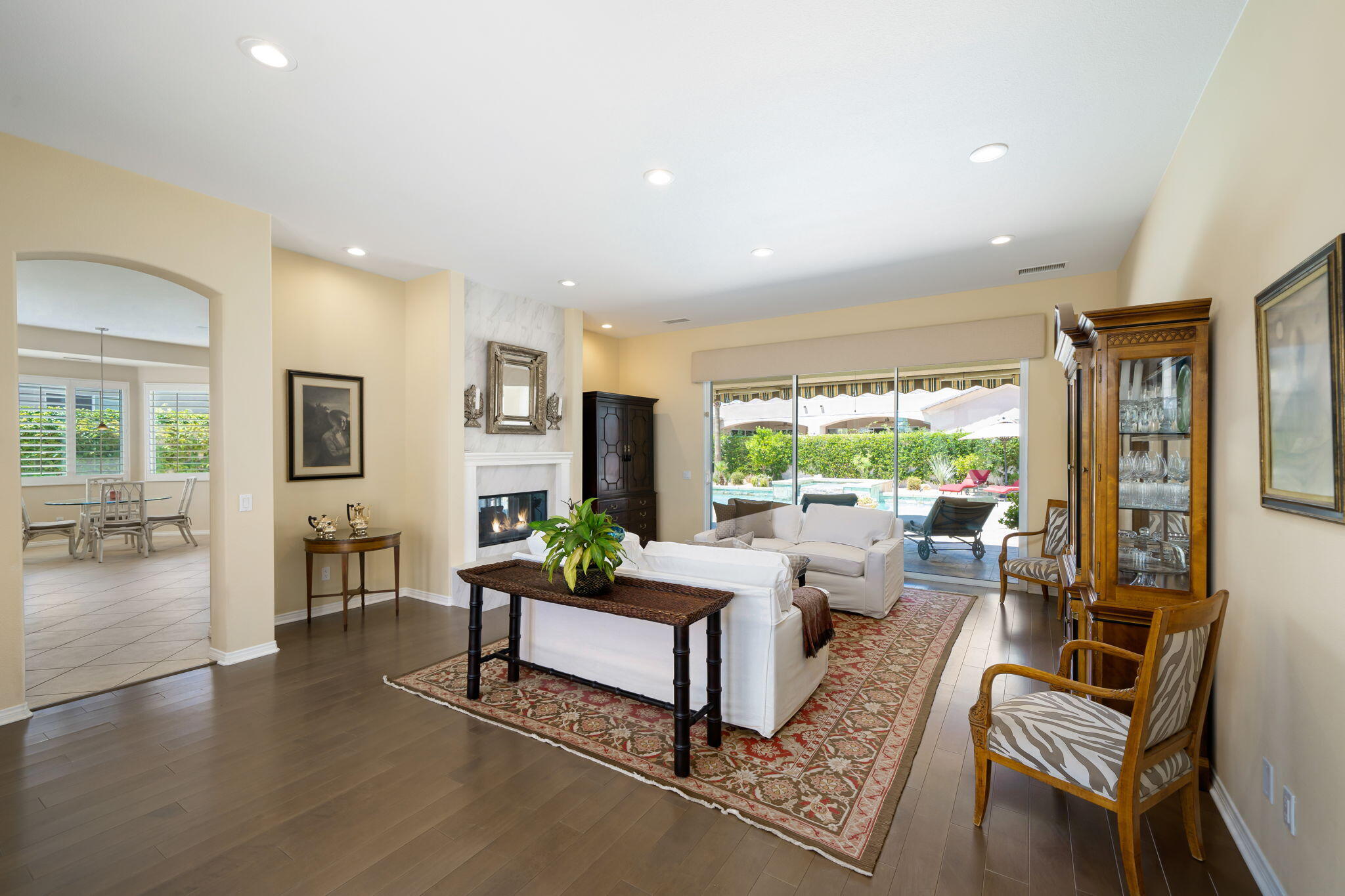 5 Lyon Road Rancho Mirage, CA 92270 - Photo 13 of 50 a living room with furniture and a large window