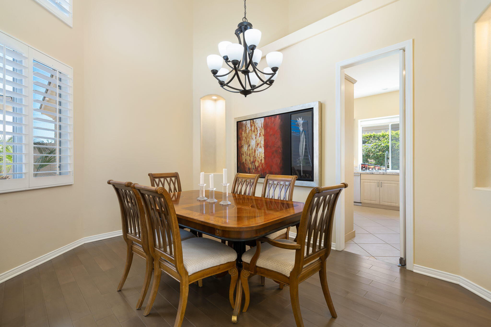 5 Lyon Road Rancho Mirage, CA 92270 - Photo 17 of 50 a view of a dining room with furniture window and wooden floor