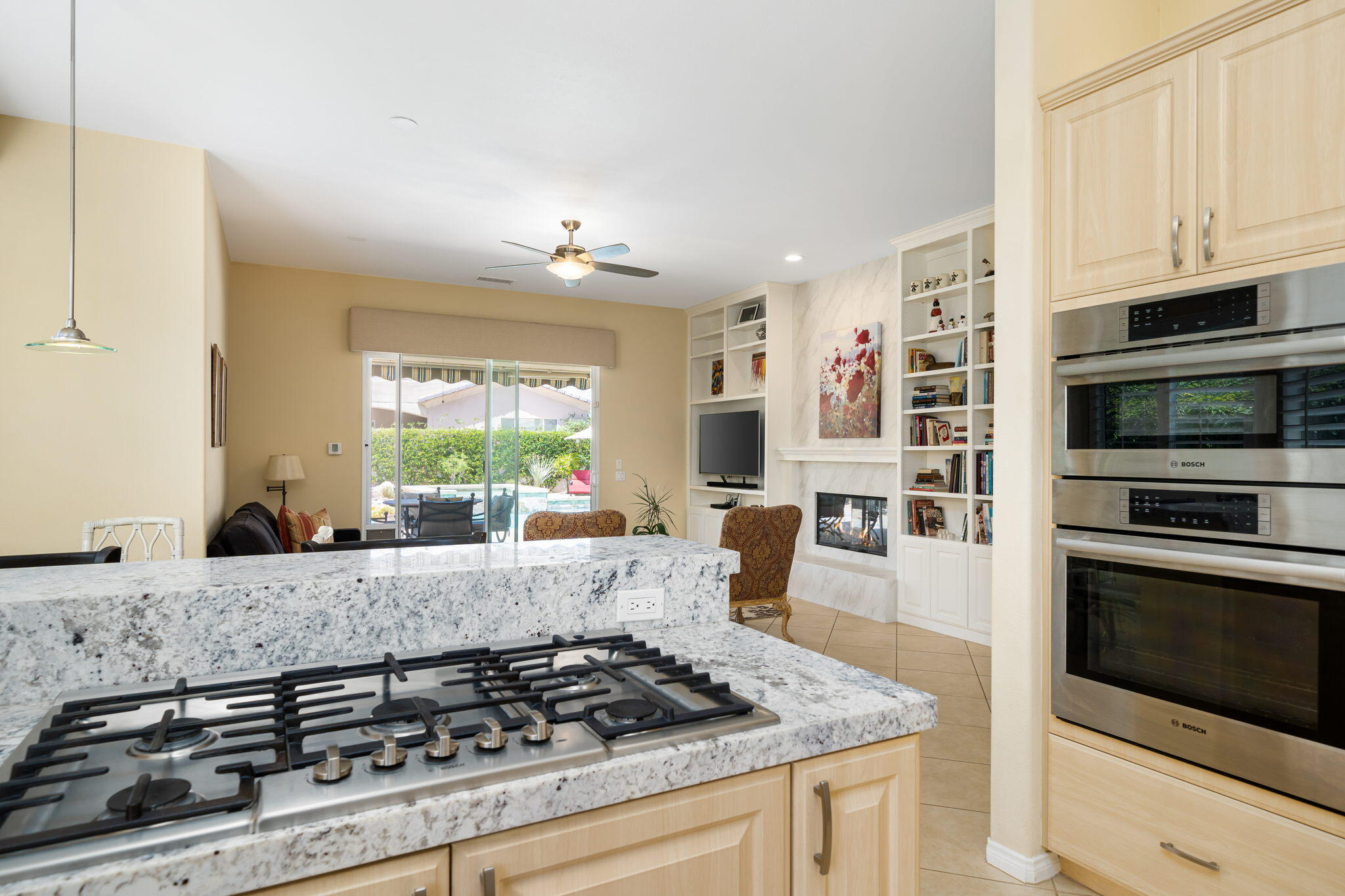 5 Lyon Road Rancho Mirage, CA 92270 - Photo 24 of 50 a kitchen with granite countertop a stove and a sink