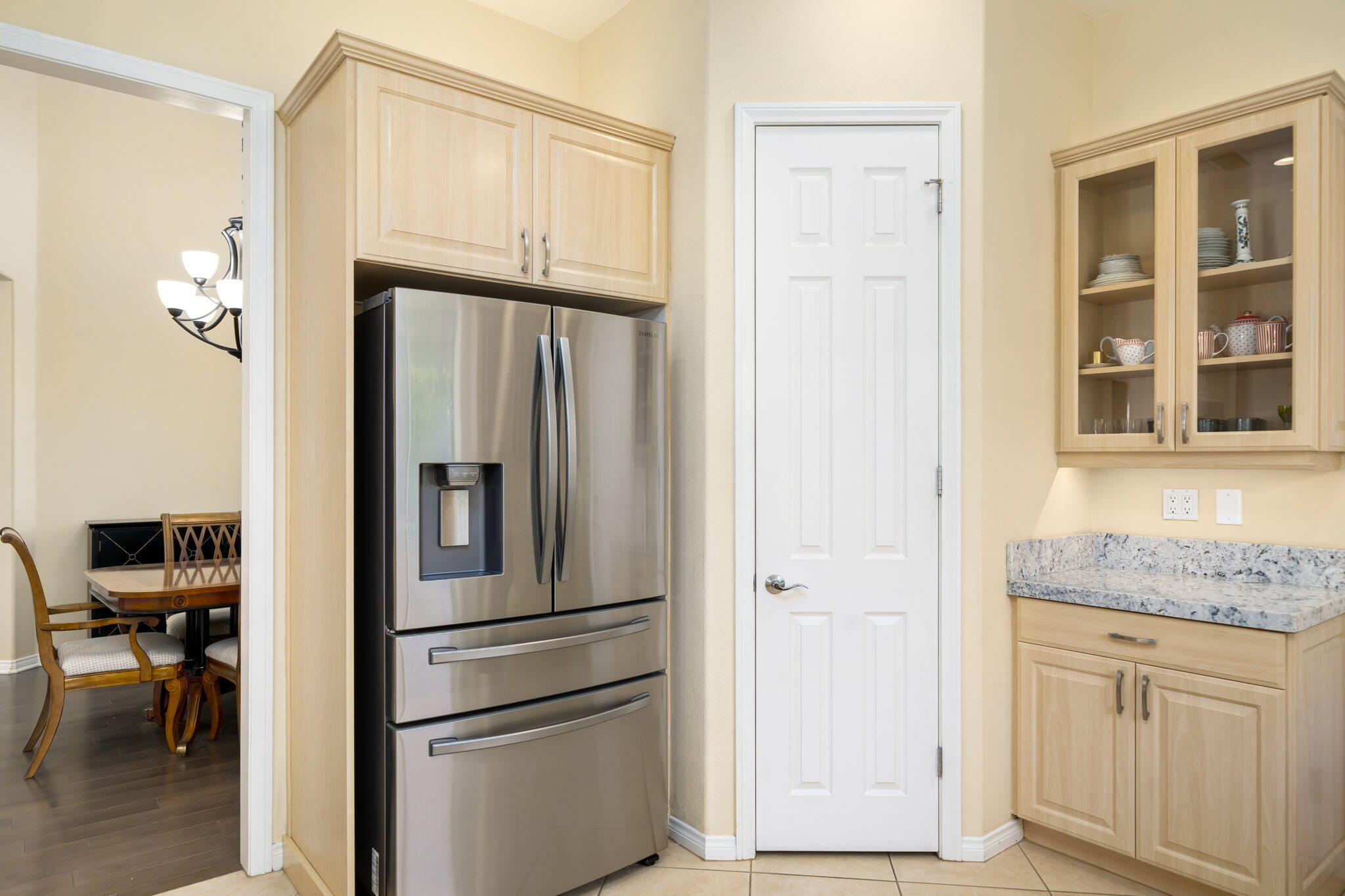 5 Lyon Road Rancho Mirage, CA 92270 - Photo 25 of 50 a kitchen with stainless steel appliances granite countertop a refrigerator and a sink