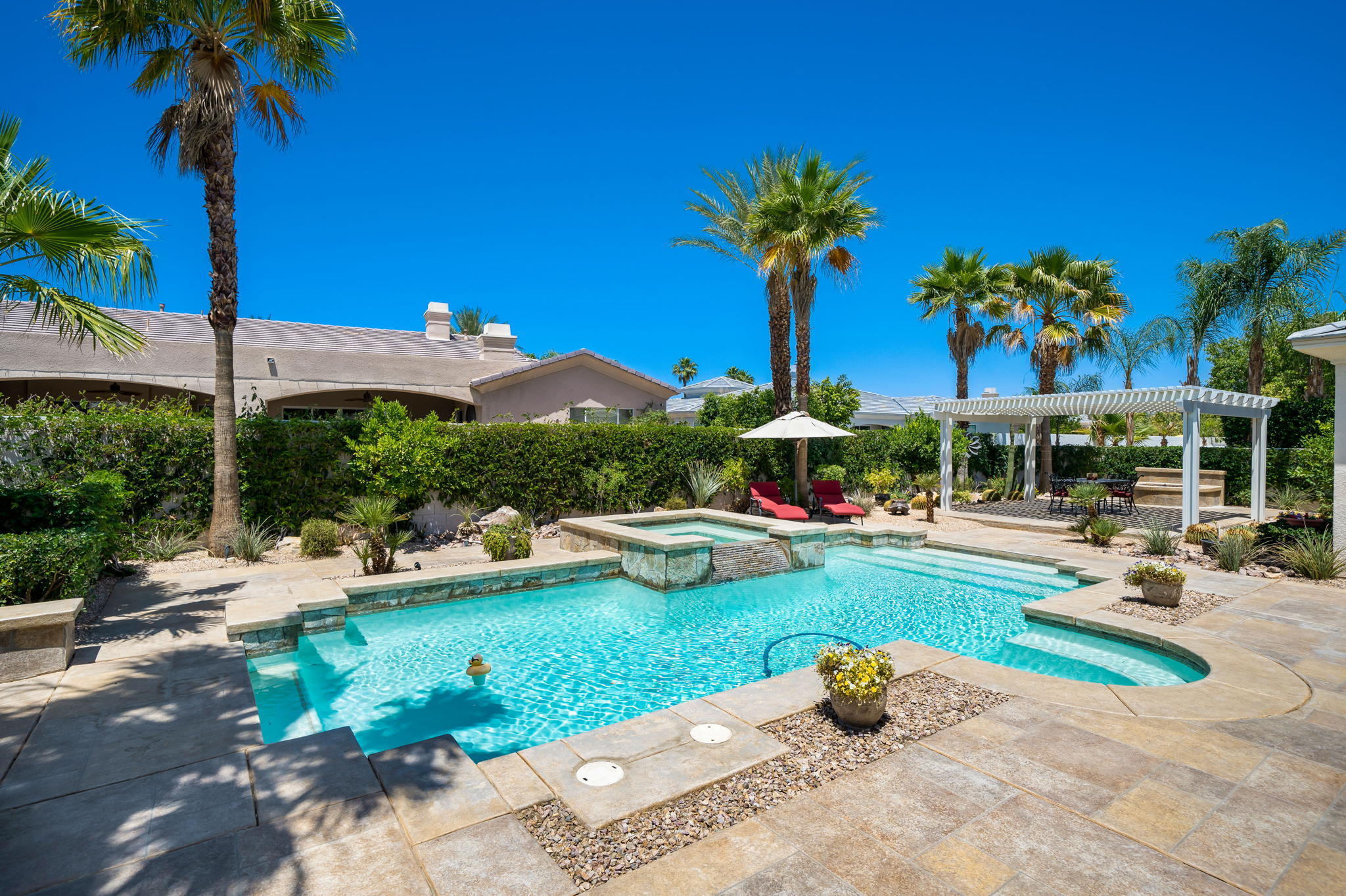 5 Lyon Road Rancho Mirage, CA 92270 - Photo 31 of 50 a childrens park with lots of swings and slides