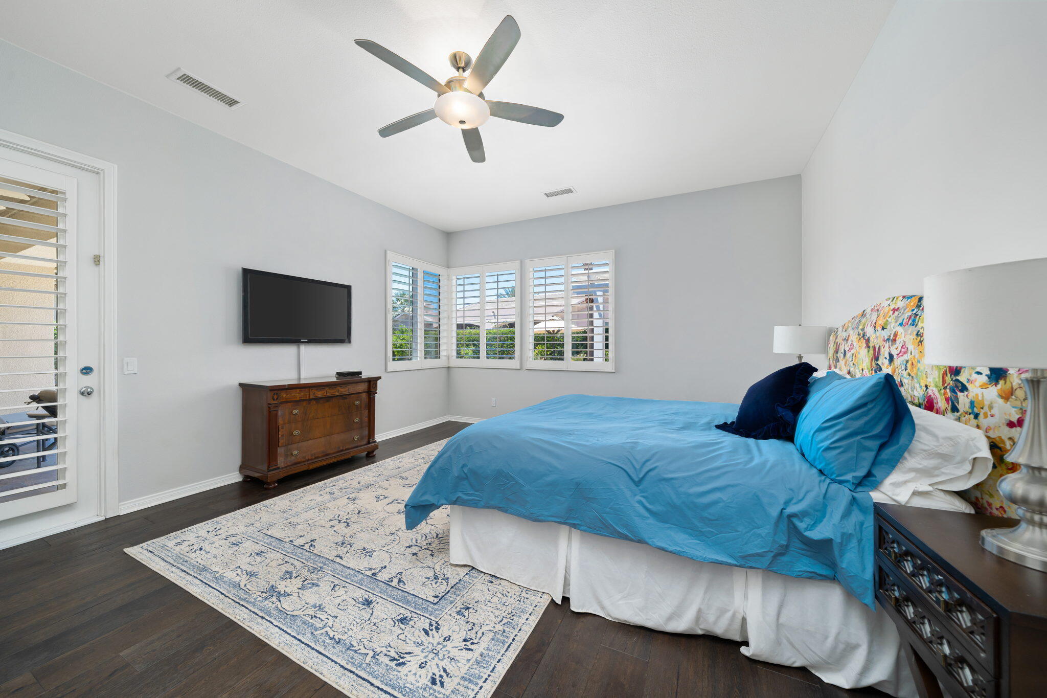 5 Lyon Road Rancho Mirage, CA 92270 - Photo 40 of 50 a bedroom with a bed and a flat screen television