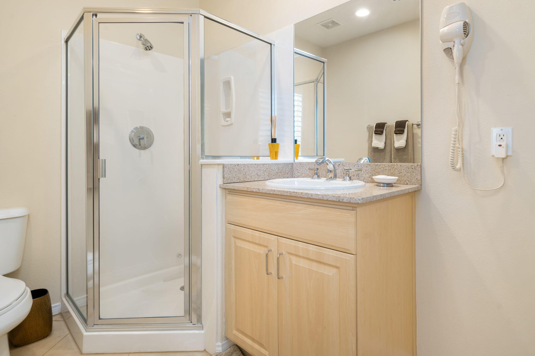 5 Lyon Road Rancho Mirage, CA 92270 - Photo 50 of 50 a bathroom with a sink a mirror and a shower