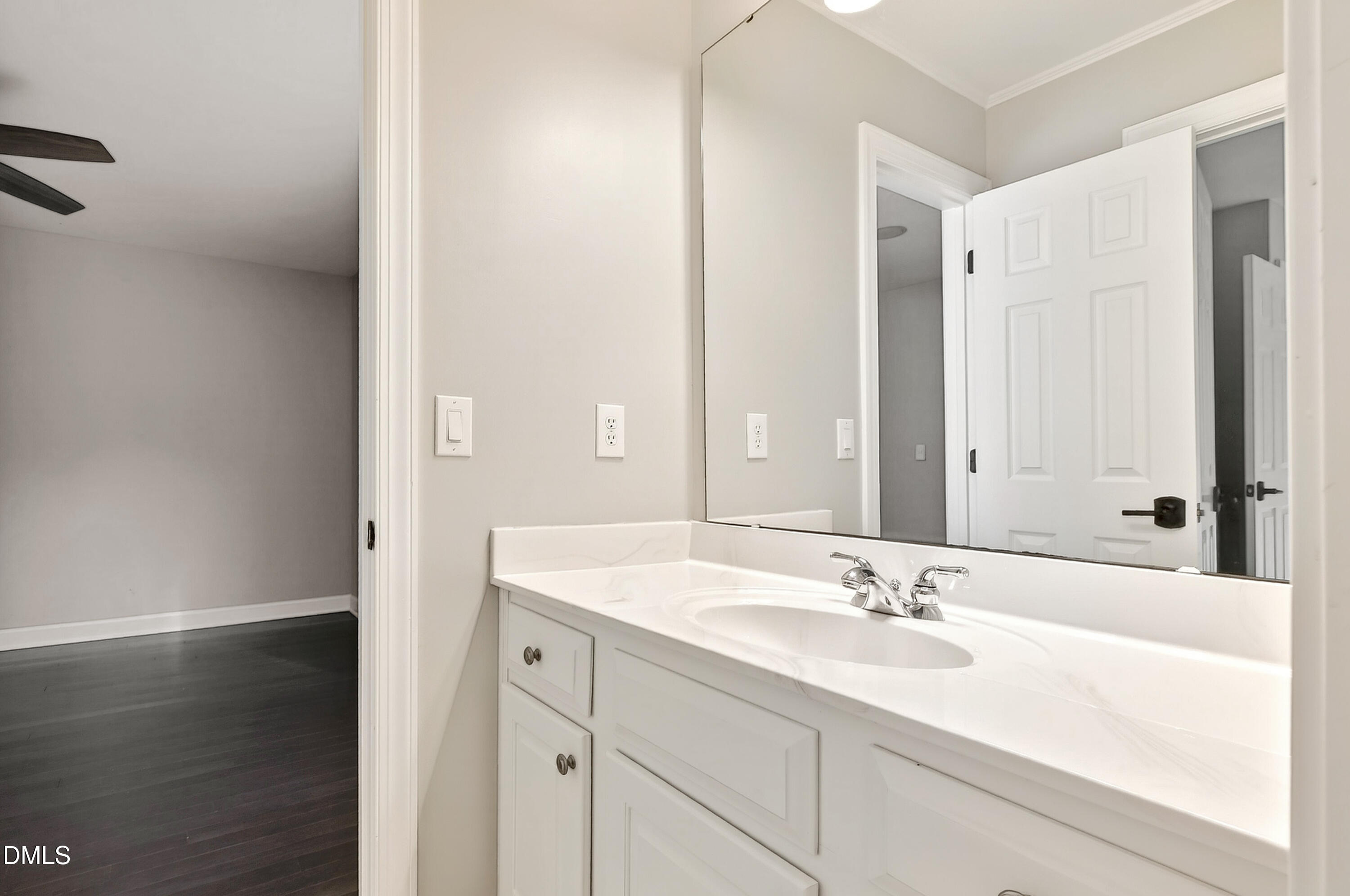 12408 Cilcain Court Raleigh, NC 27614 - Photo 30 of 80 a bathroom with a sink and a mirror