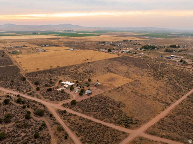 2925 Juniper Road Enterprise, UT 84725 - Photo 53 of 56 Aerial view at dusk of a rural view, a mountain view, and view of desert