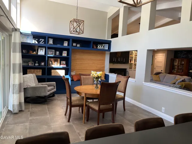 a view of a hallway view with wooden floor and staircase