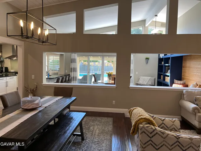 a living room with furniture and windows