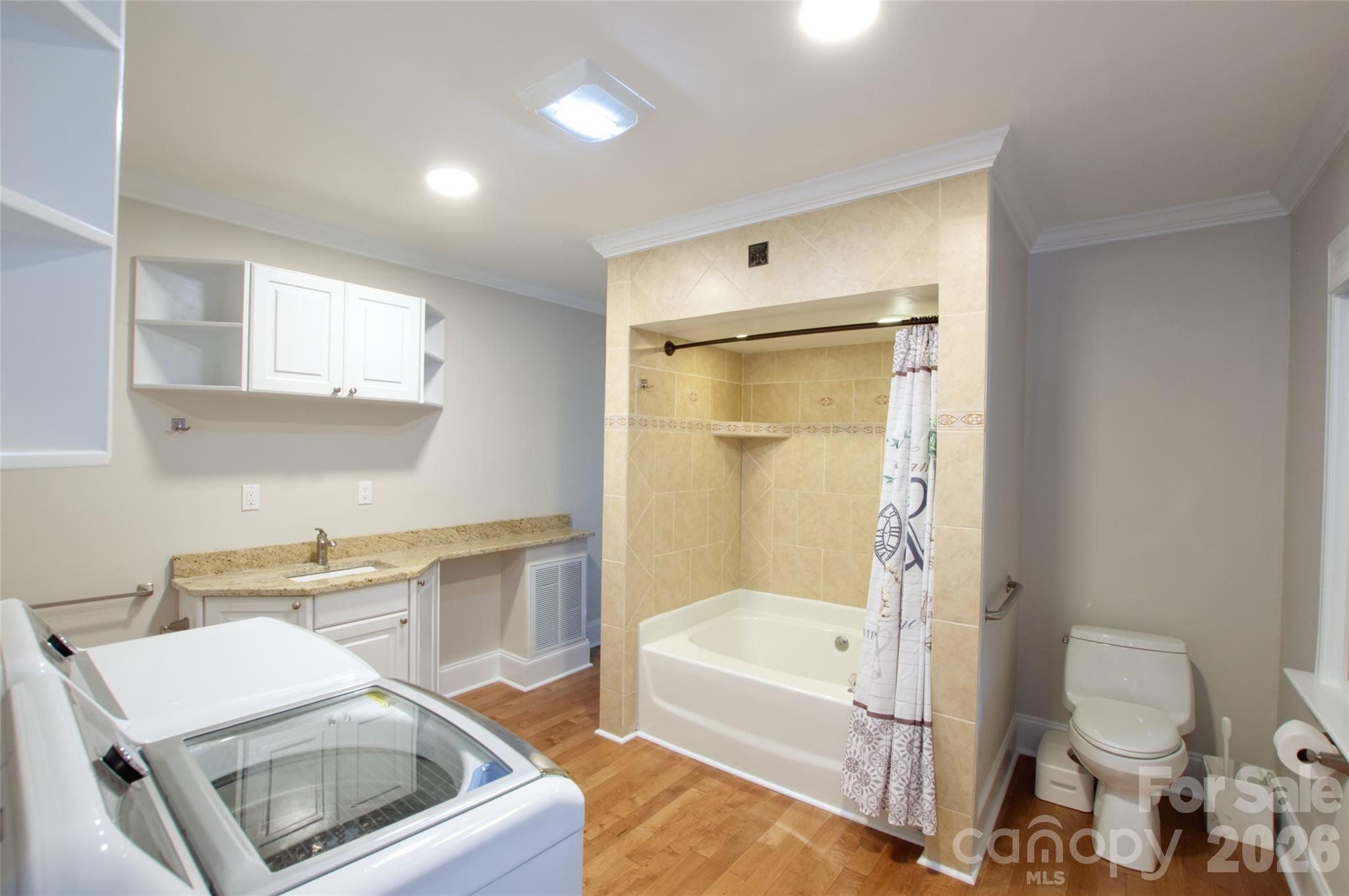 204 Clinton Avenue Clover, SC 29710 - Photo 14 of 26 a bathroom with a sink toilet and bathtub
