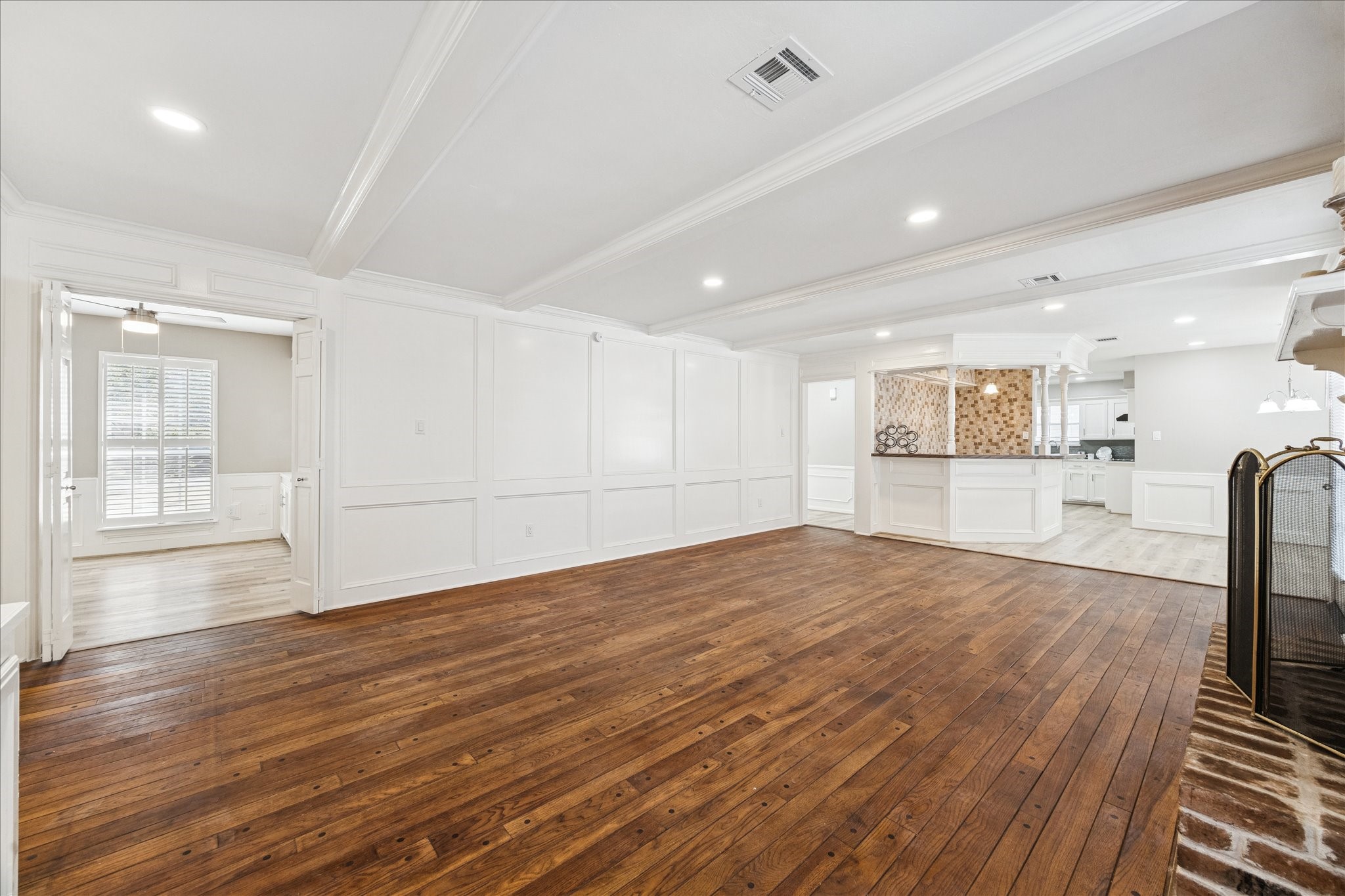 1502 Big Horn Drive Houston, TX 77090 - Photo 12 of 36 a view of an empty room and wooden floor